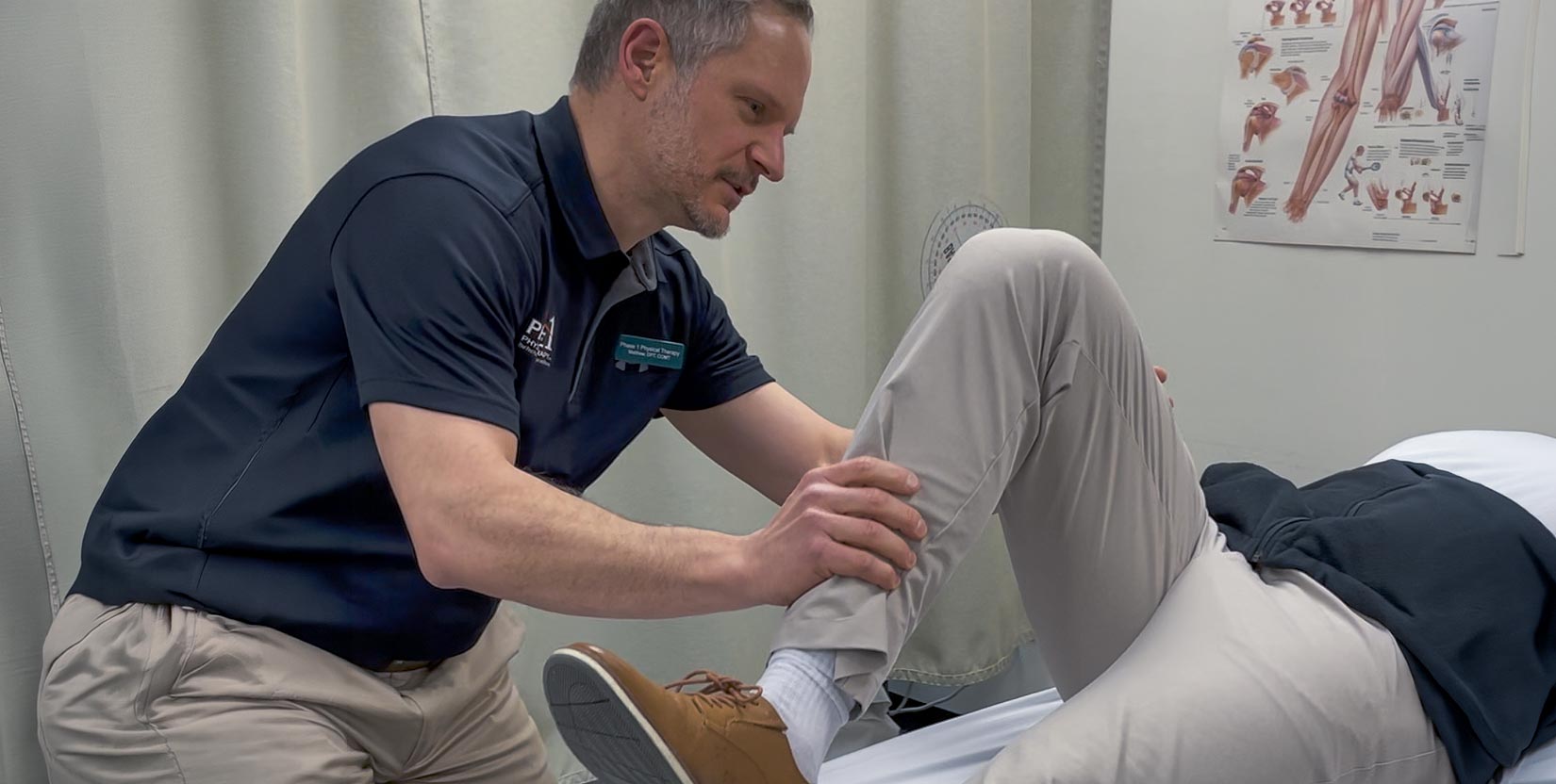 Phase 1 Physical Therapy in Spokane, WA best PT around. He is working on leg mobility in this photo